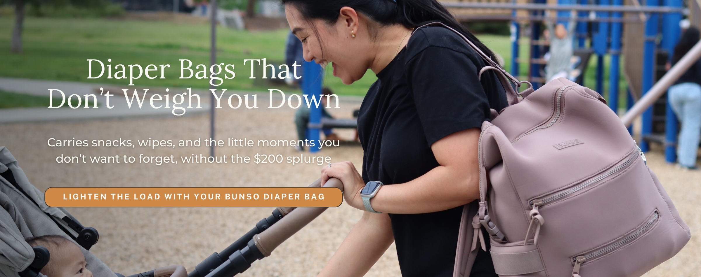 Mom carrying mauve
 bunso neoprene diaper bag